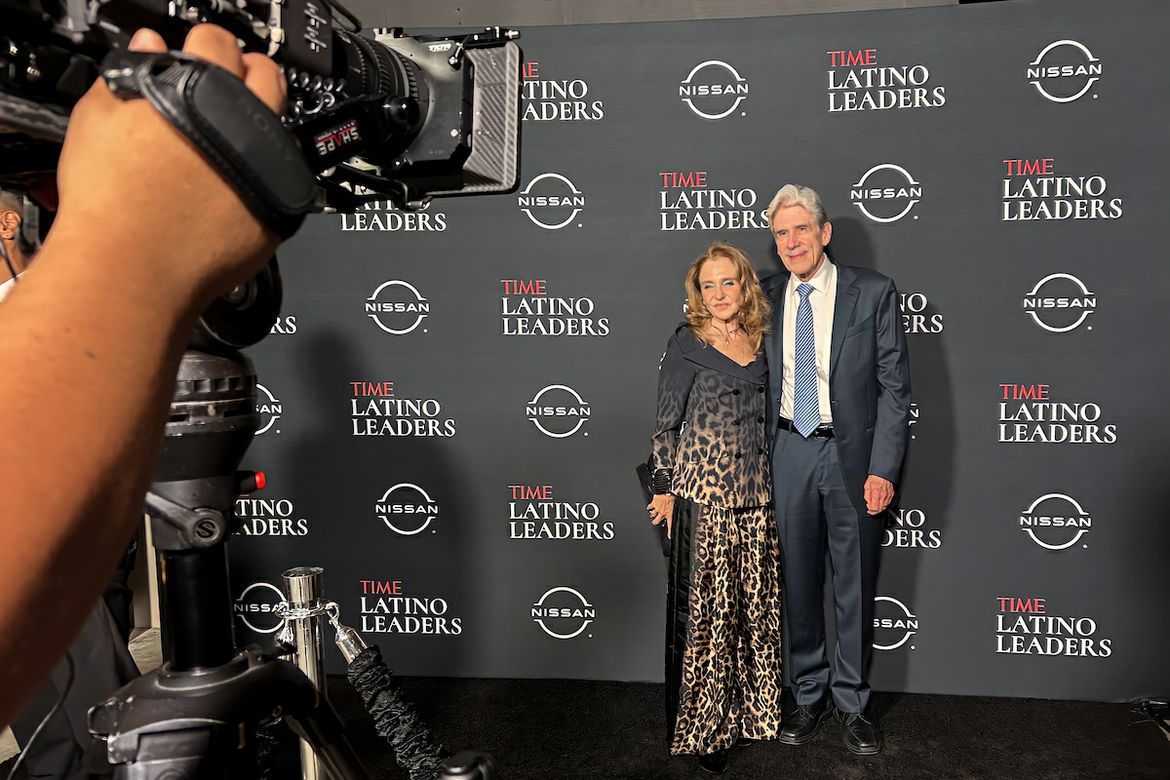 Julio Frenk and Felicia Knaul in front of TIME Latino Leaders backdrop.