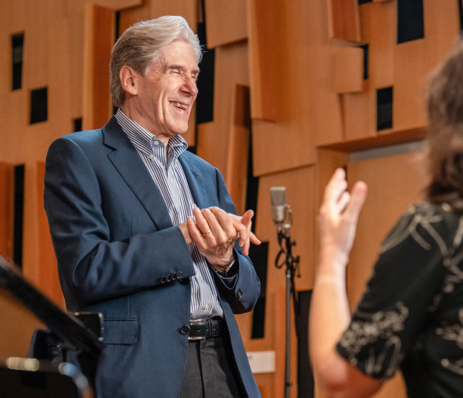 Julio Frenk speaking in a studio.