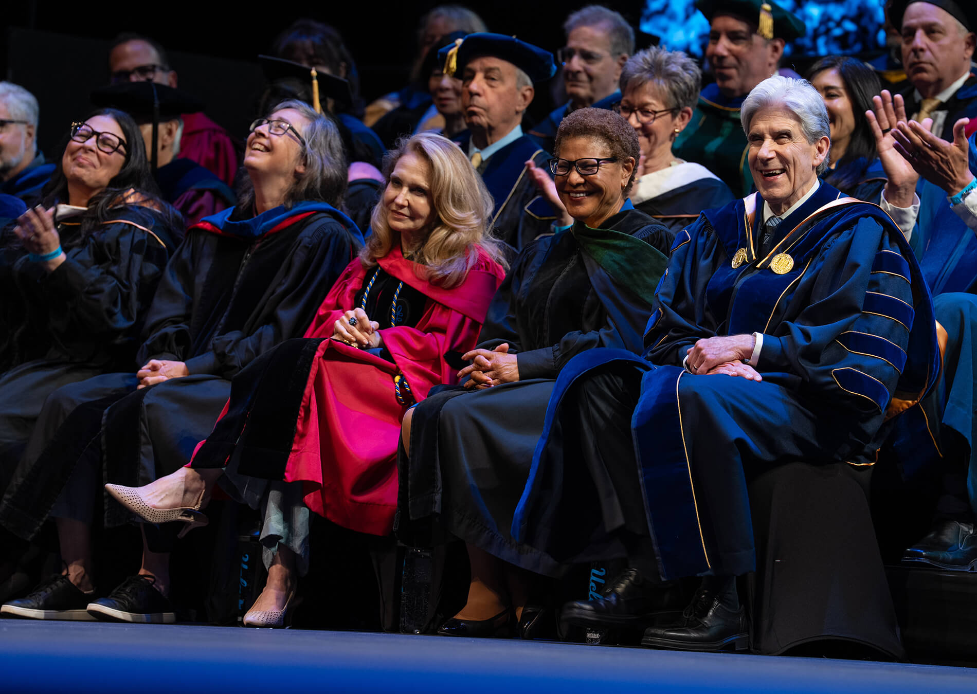 Heidi Martinez, Kathleen Bawn, Dr. Knaul, Mayor Bass, Chancellor Frenk sitting in full regalia