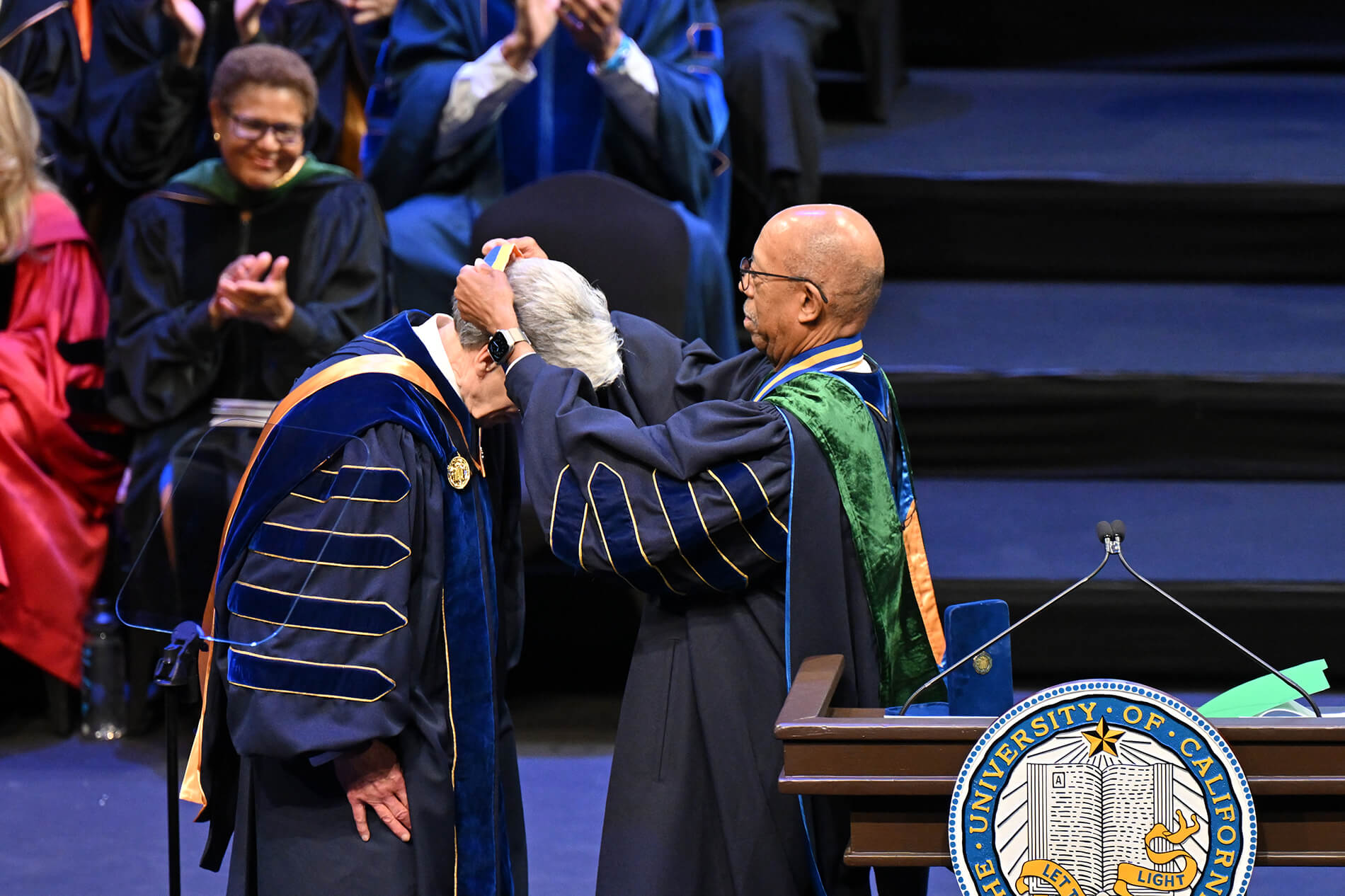 UC President Drake presents Chancellor Frenk with medal